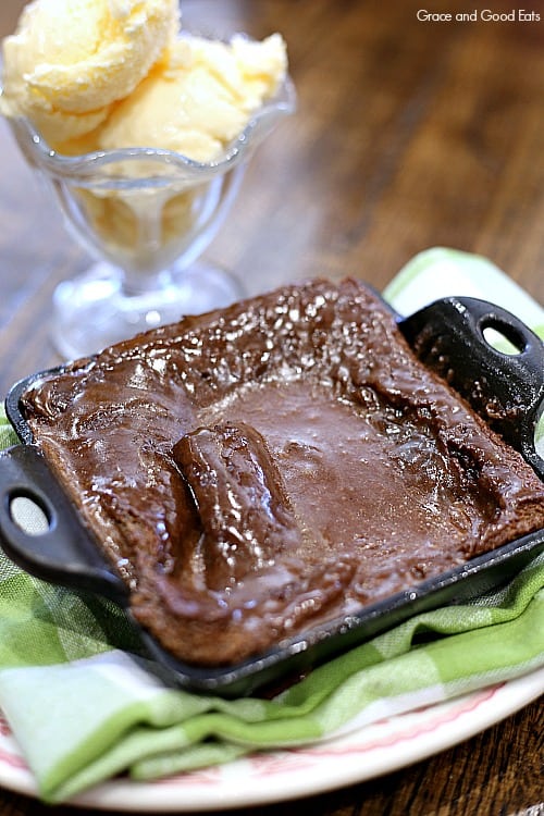 chocolate cake served in a small square cast iron skillet
