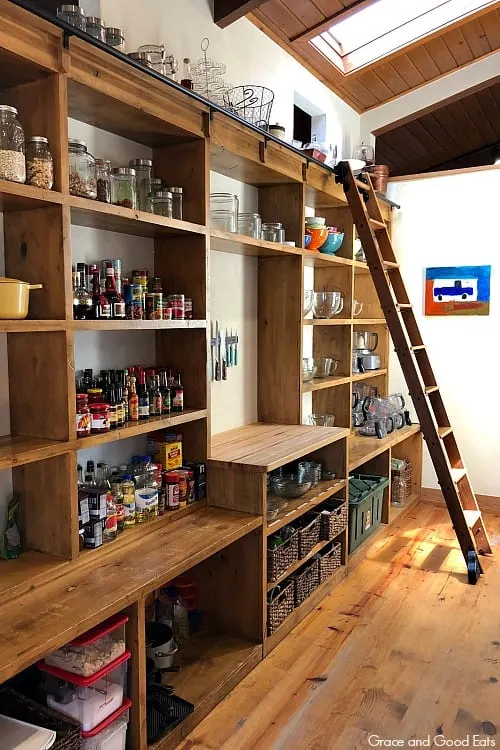 large pantry shelves with a ladder