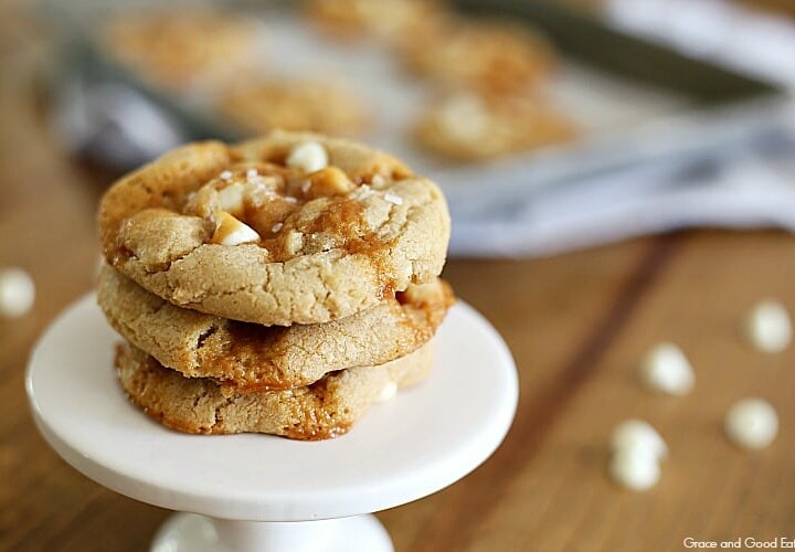 These Salted Caramel Cookies are a match in caramel + flaky sea salt + white chocolate chip Heaven.  Not only do they taste amazing, but the recipe is incredibly easy (no need to soften butter or use a stand mixer). 