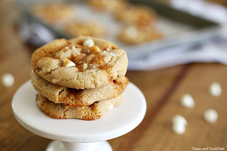 stack of three salted caramel cookies on a mini pedestal 