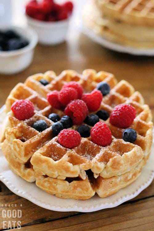 fluffy homemade waffles topped with fruit