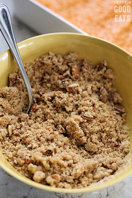 pecan topping for sweet potatoes in a yellow bowl