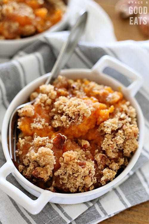 close up of sweet potato casserole with pecan topping