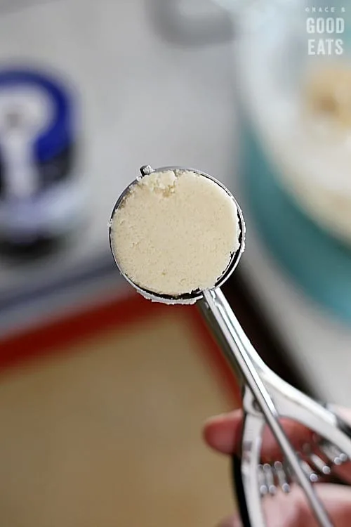 cookie scoop full of thumbprint cookie dough