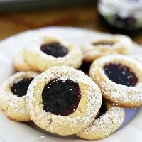 plate of easy thumbprint cookies stacked together