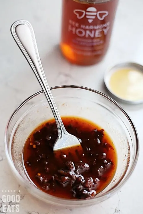 small glass bowl with honey chipotle glaze