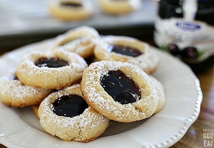 thumbprint cookies filled with black cherry fruit spread