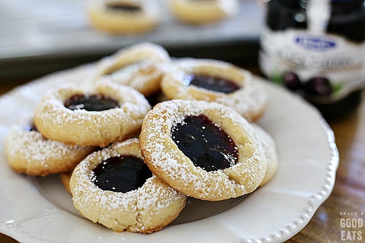 thumbprint cookies filled with black cherry fruit spread