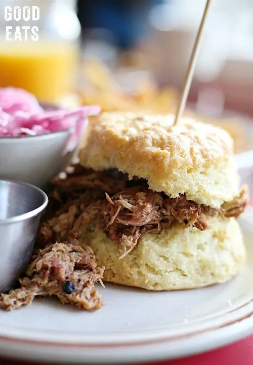 biscuit piled high with BBQ pulled pork