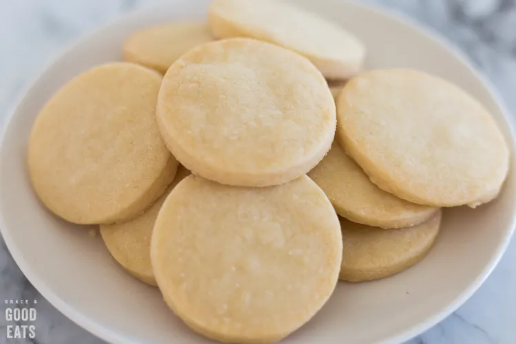 plate piled high with plain shortbread cookies