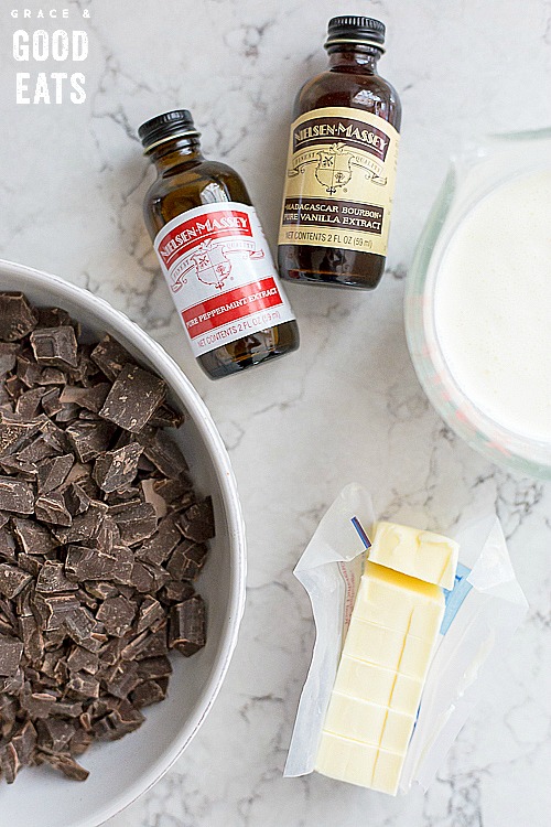 chopped chocolate next to heavy cream and cubed butter