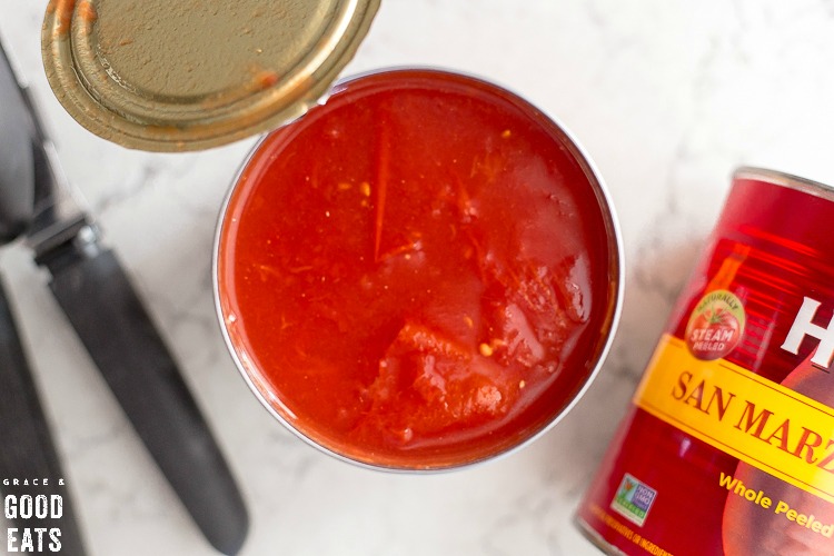 open can of whole peeled tomatoes