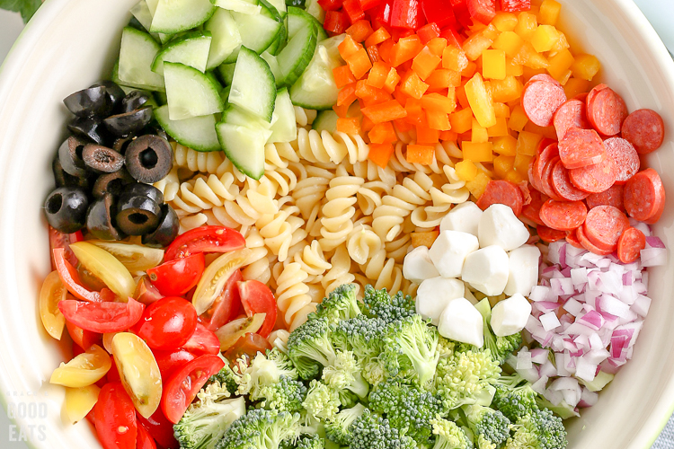 chopped veggies and cooked noodles in a bowl