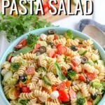 Italian Pasta Salad made with crunchy veggies, fresh mozzarella, tender rotini noodles, and a simple dressing.  This easy pasta salad recipe is deliciously flavorful as is, but also totally flexible- omit the meat, add in your favorite veggies, or sub in different cheeses to your liking.