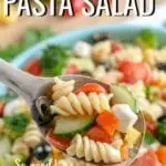 Italian Pasta Salad made with crunchy veggies, fresh mozzarella, tender rotini noodles, and a simple dressing.  This easy pasta salad recipe is deliciously flavorful as is, but also totally flexible- omit the meat, add in your favorite veggies, or sub in different cheeses to your liking.