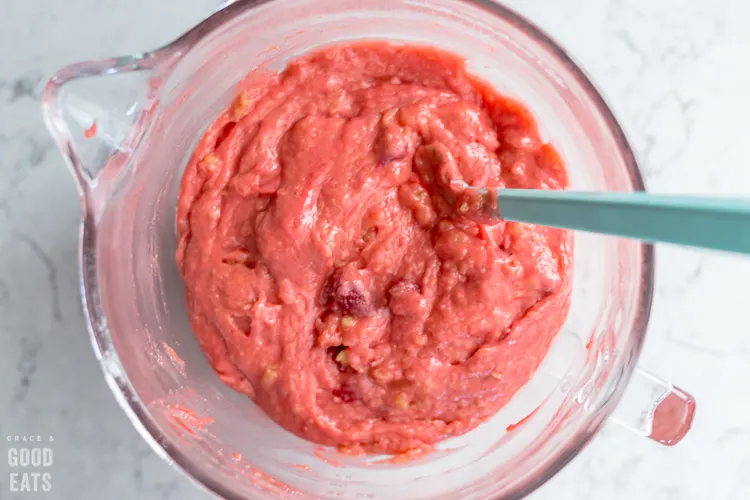 bowl of mixed strawberry bread batter