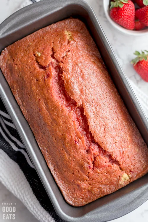 baked strawberry bread in a loaf pan