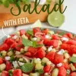 Watermelon Salad with crumbled Feta, fresh mint, and a light lime dressing makes for the perfect summertime dish.  Serve as a side with grilled chicken or spoon over arugula for a quick meal.     