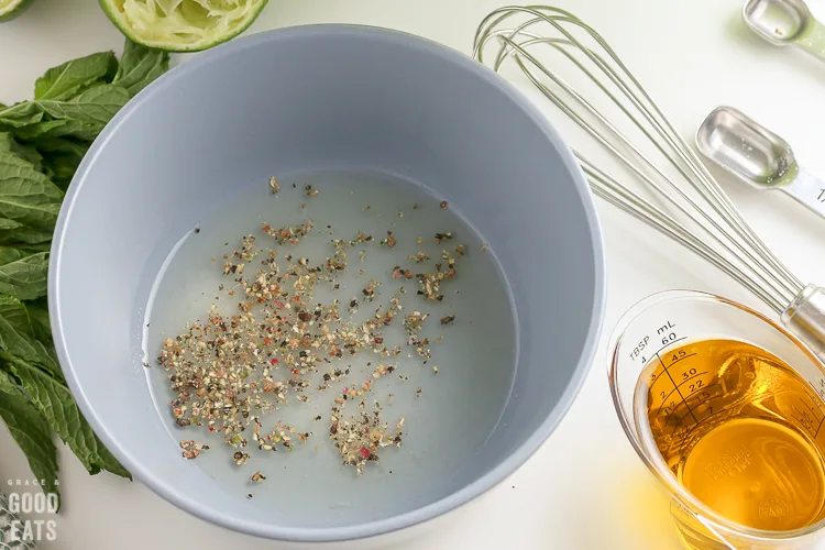 bowl with lime juice, salt, and pepper