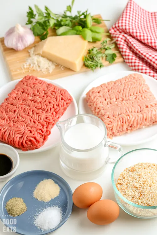 ingredients to make meatballs- meat, cheese, breadcrumbs, eggs, seasonings