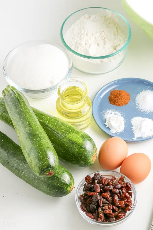 zucchini muffin ingredients: zucchini, eggs, raisins, flour, sugar, etc