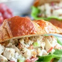 chicken salad recipe with grapes on a croissant