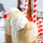 zoomed in view of root beer float in mugs