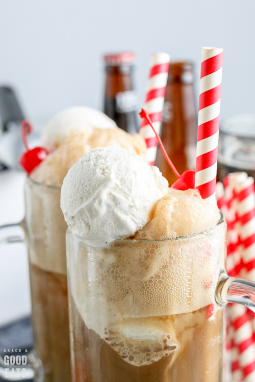 zoomed in view of root beer float in mugs