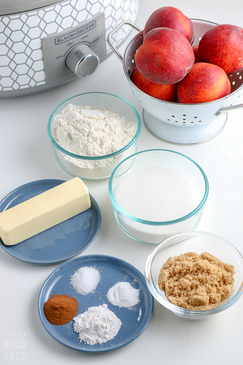 butter, flour, sugar, spices, peaches in separate bowls