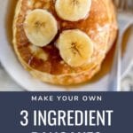 3 ingredient pancakes topped with bananas on a plate with a fork