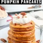 Pumpkin Pancake Recipe made with real pumpkin and seasonal spices. These pumpkin pancakes are perfect for fall with whipped cinnamon butter and maple syrup!