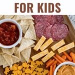 Kids Snack Ideas: create a delicious snack board with protein for growing bodies, fat for brain power and fullness, fruits and veggies for vitamins and minerals, and their favorite treats for extra fun!