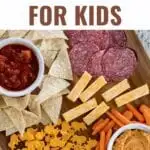 Kids Snack Ideas: create a delicious snack board with protein for growing bodies, fat for brain power and fullness, fruits and veggies for vitamins and minerals, and their favorite treats for extra fun!