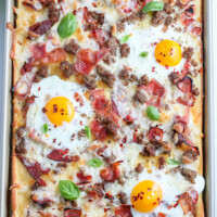 breakfast pizza on a baking sheet