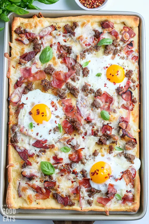 breakfast pizza on a baking sheet