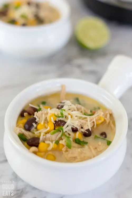bowl of soup with lime in the background