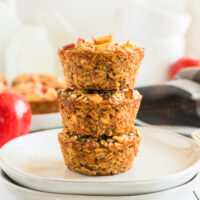 stack of three cinnamon apple oatmeal cups on a plate