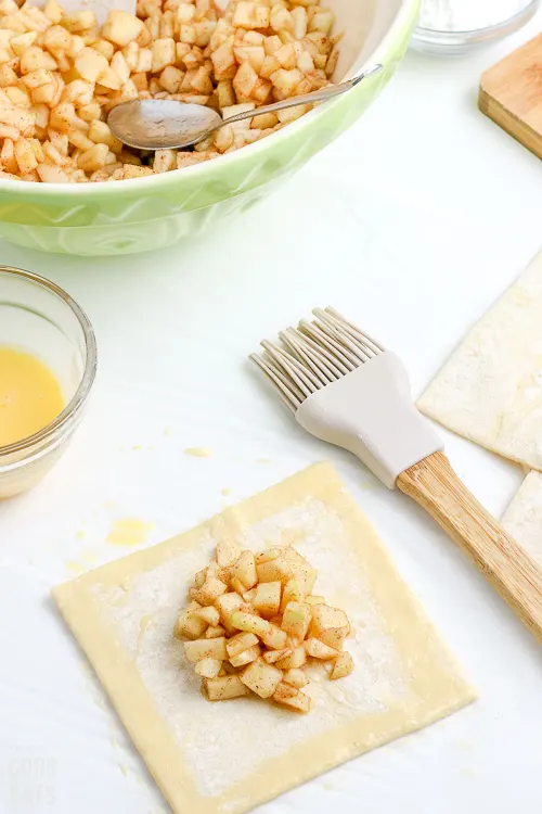 puff pastry square with apple pie filling